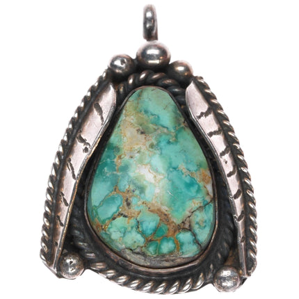 Vintage Navajo sterling silver turquoise pendant with side feathers