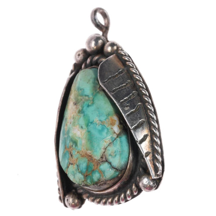 Vintage Navajo sterling silver turquoise pendant with side feathers
