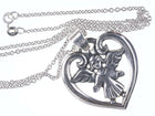 Retired James Avery Sterling guardian angel heart pendant on 18