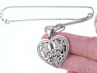 Retired James Avery Sterling Heart with doves pendant on 16