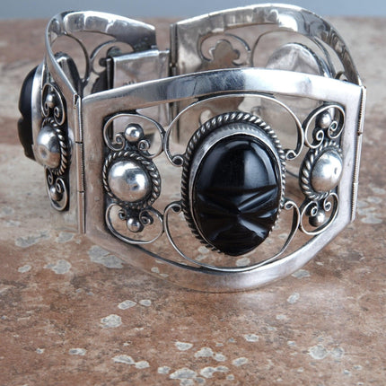 7.5" Vintage Mexican Sterling Silver Modernist onyx aztec faces bracelet - Estate Fresh Austin